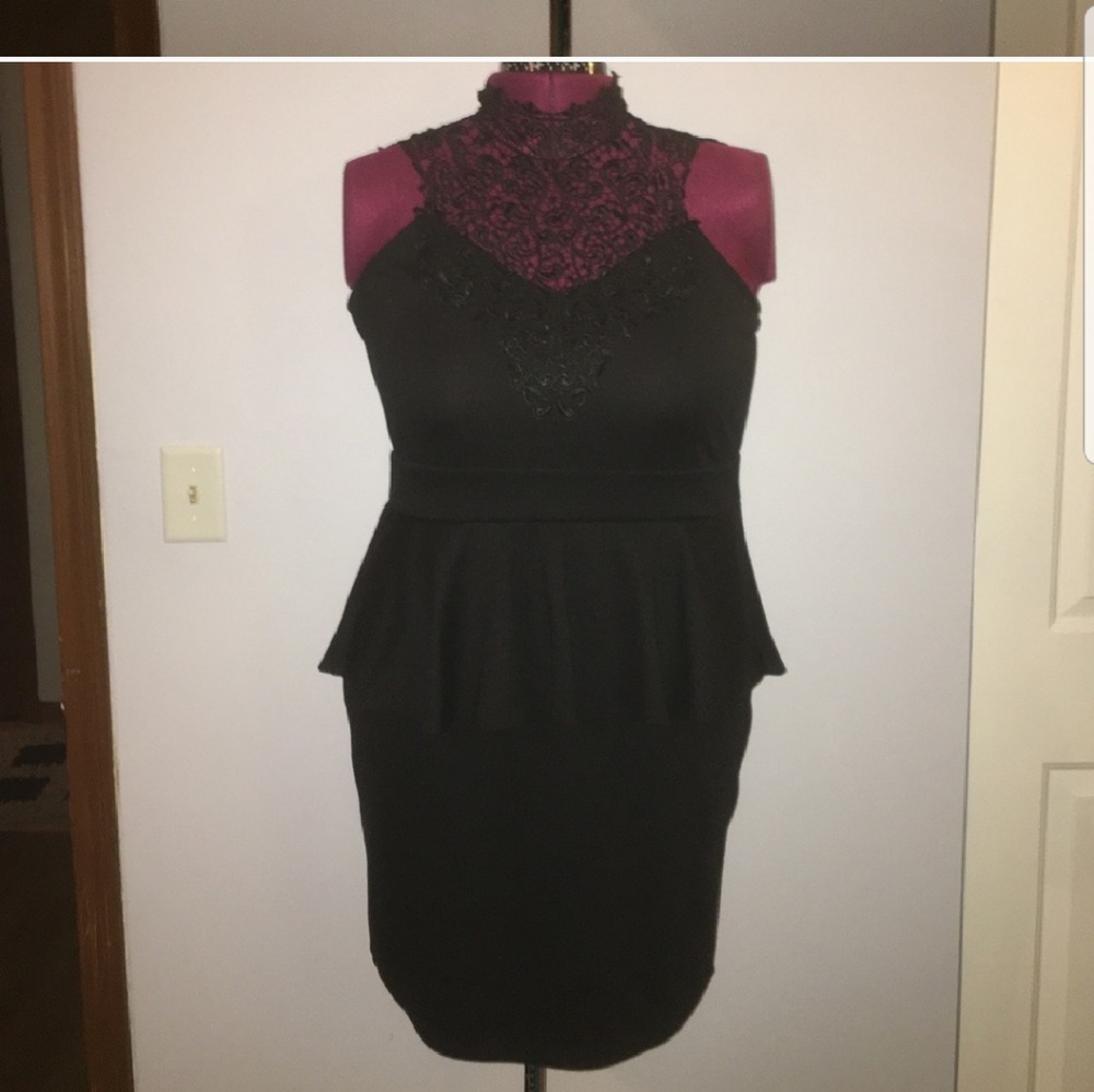 Beautiful blace lace neck peplum dress.